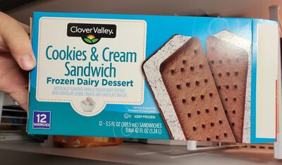 COOKIES & CREAM VANILLA FROZEN DAIRY DESSERT WITH CHOCOLATE COOKIE CRUNCH AND CHOCOLATE WAFERS SANDWICHES, COOKIES & CREAM