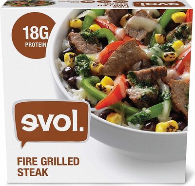 FIRE GRILLED STEAK WITH BLACK BEANS, WHITE RICE, RED & GREEN BELL PEPPERS, ROASTED CORN AND CHEDDAR CHEESE  ALL TOPPED WITH AN INSANELY TASTY CILANTRO LIME PESTO., FIRE GRILLED STEAK