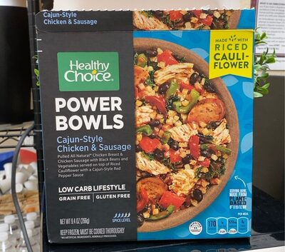 CAJUN-STYLE CHICKEN & SAUSAGE PULLED ALL NATURAL CHICKEN BREAST & CHICKEN SAUSAGE WITH BLACK BEANS AND VEGETABLES SERVED ON TOP OF RICED CAULIFLOWER WITH A CAJUN-STYLE RED PEPPER SAUCE POWER BOWLS, CAJUN-STYLE CHICKEN & SAUSAGE