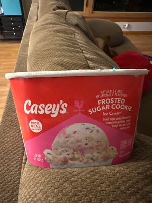 FROSTED SWEER SUGAR COOKIE FLAVOURED ICE CREAM WITH SPRINKLES, COOKIE DOUGH BITS AND A PINK FROSTING SWIRL, FROSTED SWEET SUGAR COOKIE