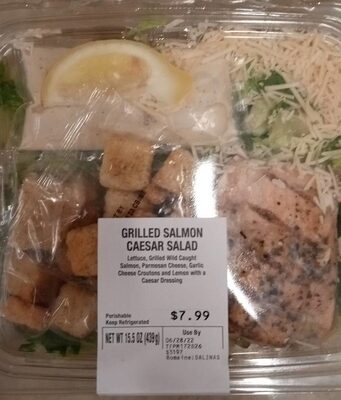 GRILLED SALMON LETTUCE, GRILLED WILD CAUGHT SALMON. PARMESAN CHEESE, GARLIC CHEESE CROUTONS AND LEMON WITH A CAESAR DRESSING SALAD, GRILLED SALMON